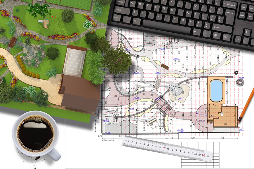 一个景观设计师的工作空间与咖啡和电脑的图像