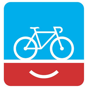 一个红、白、蓝三色的标志有一个自行车的线框，看起来就像一个微笑的嘴上面的眼睛